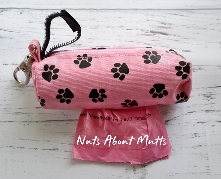 Dog waste bags, dog poo bags paws on light pink